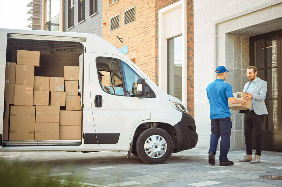 Local courier driver with package